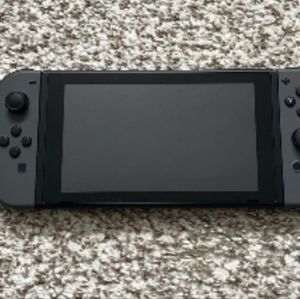 Nintendo switch console with joy con's controllers